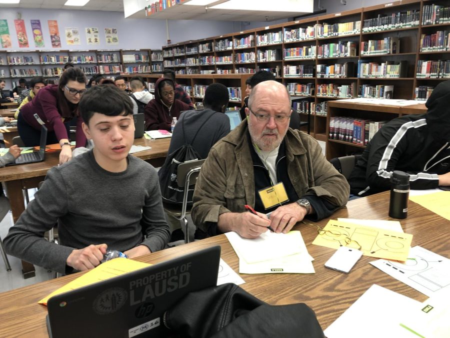 Luis Carpio receives help from a published writer and mentor, Peter.