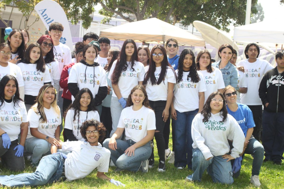 Chicas Verdes celebrate Earth Day with smiles, plants, and community spirit.

